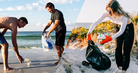 Three people cleaning up debris from the shore with the ocean on the background 